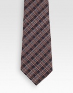 A sartorial standard woven in Italian silk.About 2.8 wideSilkDry cleanMade in Italy