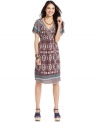 Mixed prints and chic beading at the neckline give this One World dress bohemian charm. Pair it with platform sandals in a vibrant hue to complete the look!