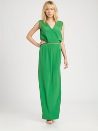 A stunning, floor-sweeping shift crafted with a sheer chiffon yoke and waist-cinching luggage belt.Foldover lapelExtended shouldersV necklineFlat frontDraped cut-out backSide zipperAbout 50 from natural waistPolyesterDry cleanImportedModel shown is 5'9½ (176cm) wearing US size 4. A stunning, floor-sweeping shift crafted with a sheer chiffon yoke and waist-cinching luggage belt.Foldover lapelExtended shouldersV necklineFlat frontDraped cut-out backSide zipperAbout 50 from natural waistPolyesterDry cleanImportedModel shown is 5'9½ (176cm) wearing US size 4.