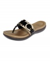 Walk away in comfortable style. The mtallic buckles add shine to the Mykos thong sandals by Circa by Joan and David.