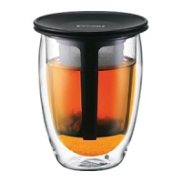 Say goodbye to tea bags and enjoy a perfect cup of tea with this stylish Tea For One set. Just like a Bodum teapot, it allows free-swirling tea leaves to release their full potential, but on a smaller, individual scale! The finely woven plastic filter ensures that leaves and kernels remain within the strainer while brewing, allowing the aroma of the tea to fully evolve without the messy remains of tea leaves escaping into the cup. The multi-functional silicone lid helps to keep the water warm while the tea is brewing and after brewing, use it as a saucer for the tea infuser. Say goodbye to tea bags and enjoy a perfect cup of tea with this stylish Tea For One set. Just like a Bodum teapot, it allows free-swirling tea leaves to release their full potential, but on a smaller, individual scale! The finely woven plastic filter ensures that leaves and kernels remain within the strainer while brewing, allowing the aroma of the tea to fully evolve without the messy remains of tea leaves escaping into the cup. The multi-functional silicone lid helps to keep the water warm while the tea is brewing and after brewing, use it as a saucer for the tea infuser.