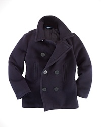 The essential pea coat in luxuriously soft wool is classically rendered for a timeless appeal. The essential pea coat in luxuriously soft wool is classically rendered for a timeless appeal.