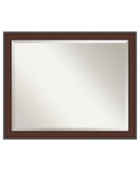 A simple frame of smooth walnut with an embossed edge makes this wall mirror a handsome, versatile accent above your sofa, armoire or dining table. Designed to hang vertically or horizontally, it's an easy enhancement for any living space. A simple frame of smooth walnut with an embossed edge makes this wall mirror a handsome, versatile accent above your sofa, armoire or dining table. Designed to hang vertically or horizontally, it's an easy enhancement for any living space.