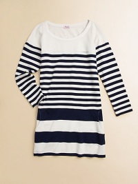 Stripes go from none at the top to thin through the body to wide at the hem in this effortless smooth knit tunic that can double as a dress.Scoop necklineLong sleevesPullover stylingModal/cottonMachine washImported Stripes go from none at the top to thin through the body to wide at the hem in this effortless smooth knit tunic that can double as a dress.Scoop necklineLong sleevesPullover stylingModal/cottonMachine washImported