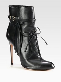Channel biker-chic vibes wearing this leather ankle boot, with fringe detailing and an adjustable buckle strap. Self-covered heel, 4 (100mm)Leather upper with adjustable buckle strapLeather lining and solePadded insoleMade in Italy Channel biker-chic vibes wearing this leather ankle boot, with fringe detailing and an adjustable buckle strap. Self-covered heel, 4 (100mm)Leather upper with adjustable buckle strapLeather lining and solePadded insoleMade in Italy