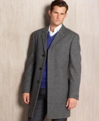 Calvin Klein takes a man's topcoat and pares it down to the absolute essentials-taking off the extra pockets, hiding the button closure under a concealing placket. Leaving you only with the warmth of wonderful wool/cashmere coating tailored into a long, lean (and flattering) line. Calvin Klein takes a man's topcoat and pares it down to the absolute essentials-taking off the extra pockets, hiding the button closure under a concealing placket. Leaving you only with the warmth of wonderful wool/cashmere coating tailored into a long, lean (and flattering) line.