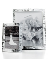 An instant update for elegant interiors, these hammered aluminum picture frames add timeless polish to any image. Two sizes create a balanced display with either portrait or landscape prints. With finished velvet backing. An instant update for elegant interiors, these hammered aluminum picture frames add timeless polish to any image. Two sizes create a balanced display with either portrait or landscape prints. With finished velvet backing.