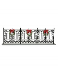 Arrange the Byers' Choice figurines in front of this faux wrought-iron fence. With traditional detail and pretty Christmas wreaths, it helps create a beautiful holiday scene. Arrange the Byers' Choice figurines in front of this faux wrought-iron fence. With traditional detail and pretty Christmas wreaths, it helps create a beautiful holiday scene.