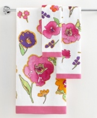 Blossoms in bloom. Bold, impressionistic florals in a fusion of dazzling colors creates a modern flair in this Floral Fusion hand towel. Blossoms in bloom. Bold, impressionistic florals in a fusion of dazzling colors creates a modern flair in this Floral Fusion hand towel.