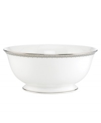 Inspired by the trim on an elegant gown, the graceful Lace Couture serving bowl features an intricate platinum border that combines harmoniously with white bone china for unparalleled style. By Lenox.