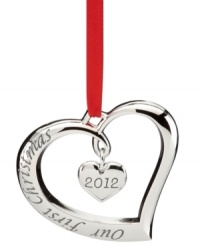 Make it official. A beauty in polished silver plate, this 2012 Lenox ornament commemorates a romantic first – Christmas together! Featuring an open heart with another danging within. Make it official. A beauty in polished silver plate, this 2012 Lenox ornament commemorates a romantic first – Christmas together! Featuring an open heart with another danging within.