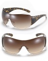 Whether it's the snow or the beach, don't forget your Prada shield sunglasses with logo detail at temples.
