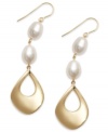 Exude elegance. These luminous drop earrings feature cultured freshwater pearls (9 mm) and a 14k gold setting with cut-out teardrop accents on french wire. Approximate drop: 2-1/2 inches.