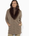 A cozy lambswool-blend cardigan is knit with ribbed sleeves and a detachable faux-fur collar for feminine style.