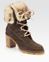 Plush shearling tops this lace-up suede essential, with a powerful heel and a rubber trek sole for extra traction. Stacked heel, 3¼ (100mm)Suede and shearling upperLeather liningRubber trek solePadded insoleImported