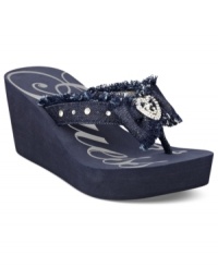 Frayed denim looks so cute on these wedges. GUESS' Sabaki platform wedge thong sandals feature a cute denim bow on the vamp with a rhinestone heart tag. Frayed denim looks so cute on these wedges. GUESS' Sabaki platform wedge thong sandals feature a cute denim bow on the vamp with a rhinestone heart tag.
