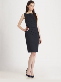 A burst of asymmetrical pleats lends a graphic appeal to this stretch twill silhouette.BoatneckSleevelessAsymmetrical pleatsBack dartsConcealed back zipFully linedAbout 22 from natural waist97% cotton/3% spandexDry cleanMade in USA of imported fabricModel shown is 5'9½ (176cm) wearing US size 4. A burst of asymmetrical pleats lends a graphic appeal to this stretch twill silhouette.BoatneckSleevelessAsymmetrical pleatsBack dartsConcealed back zipFully linedAbout 22 from natural waist97% cotton/3% spandexDry cleanMade in USA of imported fabricModel shown is 5'9½ (176cm) wearing US size 4.