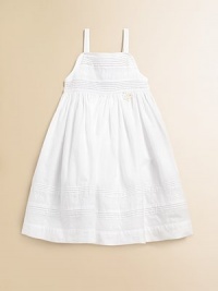 This angelic A-line silhouette is topped with pintucked and embroidered details.SquareneckSpaghetti strapsBack buttonsFull skirtCottonMachine washImported Please note: Number of buttons may vary depending on size ordered. This angelic A-line silhouette is topped with pintucked and embroidered details.SquareneckSpaghetti strapsBack buttonsFull skirtCottonMachine washImported Please note: Number of buttons may vary depending on size ordered.