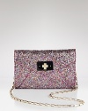 A glittering look and feel meets a cool sized-down shape-so perfect for going day to night, and just about everywhere in between. From kate spade new york.