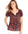 A pretty print and a peasant silhouette makes this top from Lucky Brand Jeans a bright addition to your wardrobe. Dress up with some long layering necklace for instant panache.
