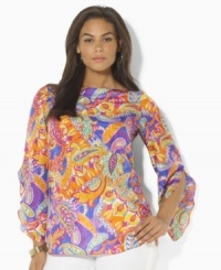A sweeping paisley pattern and flowing silhouette combine to create the bold plus size Lauren by Ralph Lauren tunic, rendered in luxe silk. A sweeping paisley pattern and flowing silhouette combine to create the bold plus size Lauren by Ralph Lauren tunic, rendered in luxe silk.