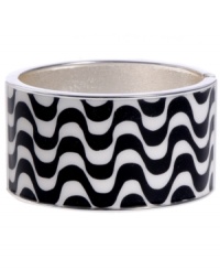 Infuse your look with the wild colors and funky patterns of Brasil. Crafted in silver tone mixed metal Haskell's Streets bangle features black and white wavy stripes and a hinge clasp. Approximate diameter: 2-1/2 inches. Approximate length: 8 inches. Item comes packaged in a turquoise gift box. Infuse your look with the wild colors and funky patterns of Brasil. Crafted in silver tone mixed metal Haskell's Streets bangle features black and white wavy stripes and a hinge clasp. Approximate diameter: 2-1/2 inches. Approximate length: 8 inches. Item comes packaged in a turquoise gift box.