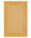A looped center of mottled tones is framed by rich color in tufted pile, presenting a modern area rug that is both casual and practical. Hand tufted in India of pure wool fibers, the Madrid area rug is a comforting, stylish addition to any decor.