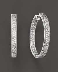 Inside-out earrings, circles with diamonds, are a new twist on the classic hoop. Inside-out earrings, circles with diamonds, are a new twist on the classic hoop.