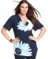 Beautiful blossoms illuminate INC's short sleeve plus size top for a season-perfect look!