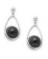 Elegant in onyx. This pair of sterling silver drop earrings brings an understated, yet refined, tone with onyx beads (10 mm) enhancing the appeal. Approximate length: 1 inch. Approximate width: 1/2 inch.