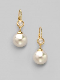 A perfectly round sphere of white organic pearl, sparkling stud and 18k gold vermeil for a look of timeless elegance.12mm round white pearls Cubic zirconia 18k gold vermeil Drop, about 1½ Ear wire Made in Spain 