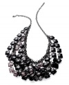 Bold style with modern sophistication. This Charter Club necklace shakes and shimmers with layers of jet acrylic beads. Crafted in hematite tone mixed metal. Approximate length: 9 inches + 3-1/3-inch extender. Approximate drop: 2-1/2 inches.
