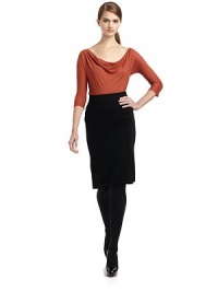 THE LOOKWide cowlneckThree-quarter, slight dolman sleevesTHE FITAbout 25½ from shoulder to hemTHE MATERIAL90% viscose/10% cashmereCARE & ORIGINDry cleanMade in ItalyModel shown is 5'10 (177cm) wearing US size 4. THE LOOKWide cowlneckThree-quarter, slight dolman sleevesTHE FITAbout 25½ from shoulder to hemTHE MATERIAL90% viscose/10% cashmereCARE & ORIGINDry cleanMade in ItalyModel shown is 5'10 (177cm) wearing US size 4.