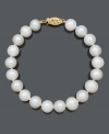 A timeless piece that makes the perfect gift. Bracelet features a simple strand of cultured freshwater pearls (9-10 mm) with a 14k gold clasp. Approximate length: 8 inches.