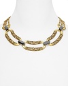 A Deco-inspired showpiece from T Tahari, this bold necklace brings instant glamor to your look, cast in plated metal with rich stone detailing.