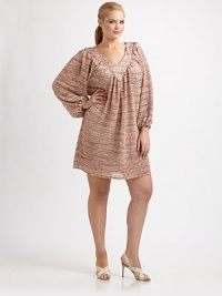 A timeless design with a feminine neckline, flattering gathered details and a relaxed fit for comfort and infinite style.V-necklineBlouson sleevesGathered detailsAbout 36 from shoulder to hemRaschelDry cleanMade in USA A timeless design with a feminine neckline, flattering gathered details and a relaxed fit for comfort and infinite style.V-necklineBlouson sleevesGathered detailsAbout 36 from shoulder to hemRaschelDry cleanMade in USA