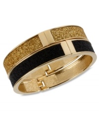 A totally dynamic duo. Betsey Johnson's two bangle set makes quite the statement in chic, contrasting colors. Crafted in gold tone mixed metal with a glitter overlay and secure hinge clasp. Approximate length: 8 inches. Approximate diameter: 2-3/8 inches. A totally dynamic duo. Betsey Johnson's two bangle set makes quite the statement in chic, contrasting colors. Crafted in gold tone mixed metal with a glitter overlay and secure hinge clasp. Approximate length: 8 inches. Approximate diameter: 2-3/8 inches.
