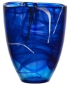 Layered in royal blue and contrasting strokes of black and white, this large glass vase is a true conversation piece. A handmade creation that will add zest to any room. Designed by Anna Ehrner for Kosta Boda.