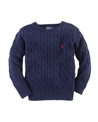 A classic long-sleeved crewneck sweater is rendered in ultra-soft cabled cotton. A classic long-sleeved crewneck sweater is rendered in ultra-soft cabled cotton.
