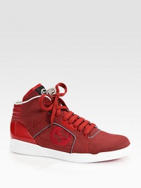 Sneaker of technical fabric with leather trim.Interlocking G detailPatent leather backRubber sole with Gucci logoMade in Italy Sneaker of technical fabric with leather trim.Interlocking G detailPatent leather backRubber sole with Gucci logoMade in Italy