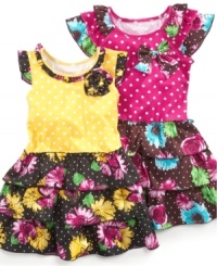 Your little flower. Dress her up in precious polka dots and the dainty floral prints on this dress from Nannette. Your little flower. Dress her up in precious polka dots and the dainty floral prints on this dress from Nannette.