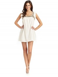 THE LOOKOrnately beaded front and back insetsRuffled shoulder strapsCrinkled textureCutout back detailsTHE FITAbout 31 from shoulder to hemTHE MATERIALCottonFully linedCARE & ORIGINDry cleanImportedModel shown is 5'10 (177cm) wearing US size 4. THE LOOKOrnately beaded front and back insetsRuffled shoulder strapsCrinkled textureCutout back detailsTHE FITAbout 31 from shoulder to hemTHE MATERIALCottonFully linedCARE & ORIGINDry cleanImportedModel shown is 5'10 (177cm) wearing US size 4.