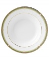 The exotic floral design of the Oberon dinnerware and dishes pattern by Wedgwood features soft shades of green and gold accented with black, against white bone china.