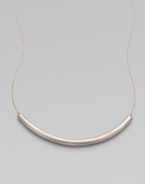 Eye-catching in its elegant simplicity, a gracefully curved, matte-finished silver bar appears to float on a delicate golden chain.SilverplatedGoldtoneLength, about 18Hook claspMade in USA
