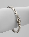From the Classic Chain Collection. Essential Hardy, this flexible braid of sterling silver has a signature clasp.Sterling silver Length, about 7¼ Push-lock clasp Made in Bali