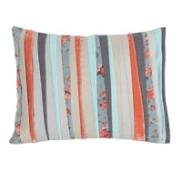 This charming pillow features finely tailored, asymmetrical pleats that add texture-on-texture detail to a mélange of London Calling textiles, including metallic linen, minty tulle, rose velvet, charcoal grey linen and a multicolor floral print.