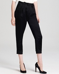 Flaunt new-season elegance with these MARC BY MARC JACOBS cropped pants. Flaunting satin at the front and a textured back, this sophisticated silhouette moves from the office to off hours in refined style. Flaunt new-season elegance with these MARC BY MARC JACOBS cropped pants. Flaunting satin at the front and a textured back, this sophisticated silhouette moves from the office to off hours in refined style.