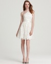 Dainty and demure, this Aidan Mattox dress of delicate lace exudes ladylike charm.
