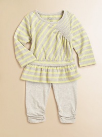 Shoulder pleats and peplum hem add fabulous style to a striped top with matching leggings.CrewneckLong sleevesPullover stylePeplum hem Leggings Elastic waistbandRuched hemCottonMachine washImported Shoulder pleats and peplum hem add fabulous style to a striped top with matching leggings.CrewneckLong sleevesPullover stylePeplum hem Leggings Elastic waistbandRuched hemCottonMachine washImported