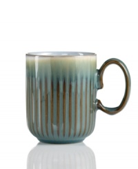 A rustic glaze, textured feel and rounded base make Denby's fluted mug a stylish go-to for cocoa, coffee and soup. Ultra-sturdy stoneware heats and reheats easily for everyday, anytime use. A rustic glaze, textured feel and rounded base make Denby's fluted mug a stylish go-to for cocoa, coffee and soup. Ultra-sturdy stoneware heats and reheats easily for everyday, anytime use.